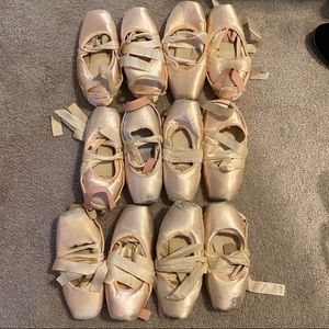 12 Pair of dead pointe shoes